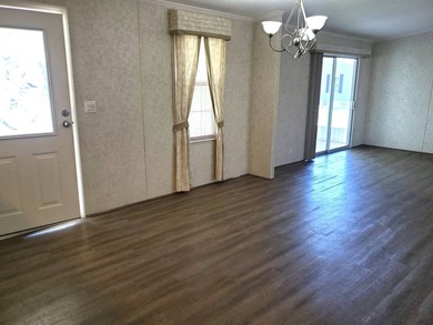 THIS HOME IS ON LEASED LAND WITH A MONTHLY LOT RENT OF $542 AND - photo 25
