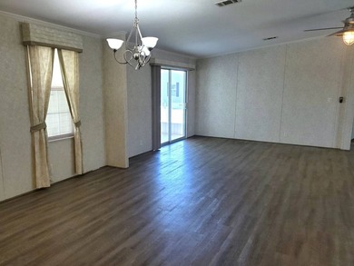 THIS HOME IS ON LEASED LAND WITH A MONTHLY LOT RENT OF $542 AND - photo 27
