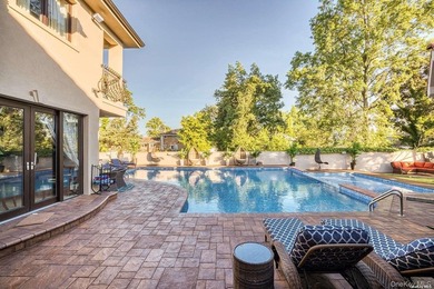 Welcome to this stunning custom-built Mediterranean home, where - photo 31