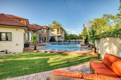 Welcome to this stunning custom-built Mediterranean home, where - photo 34