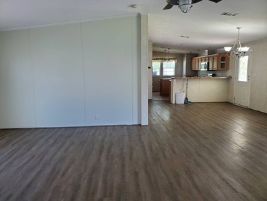 THIS HOME IS ON LEASED LAND WITH A MONTHLY LOT RENT OF $542 AND - photo 35