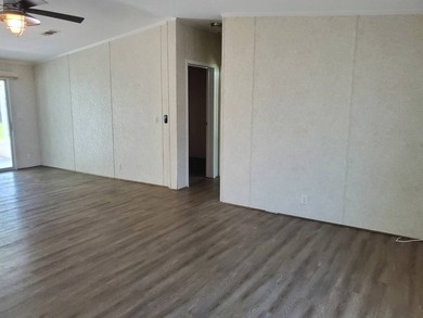 THIS HOME IS ON LEASED LAND WITH A MONTHLY LOT RENT OF $542 AND - photo 37