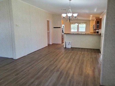 THIS HOME IS ON LEASED LAND WITH A MONTHLY LOT RENT OF $542 AND - photo 38