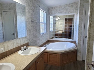 THIS HOME IS ON LEASED LAND WITH A MONTHLY LOT RENT OF $542 AND - photo 49