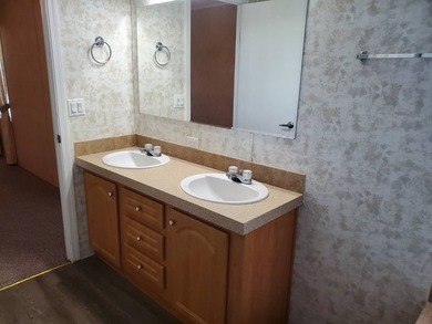 THIS HOME IS ON LEASED LAND WITH A MONTHLY LOT RENT OF $542 AND - photo 50