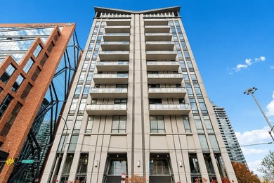 Experience elevated city living in this well-maintained - photo 1