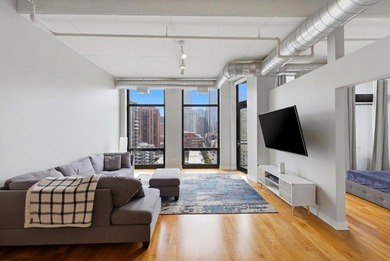 Experience elevated city living in this well-maintained - photo 3
