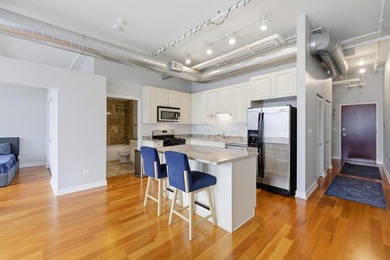 Experience elevated city living in this well-maintained - photo 4