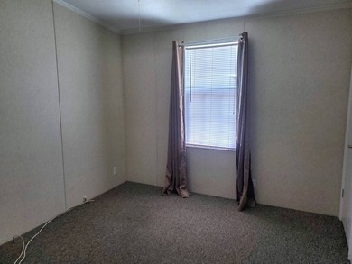 THIS HOME IS ON LEASED LAND WITH A MONTHLY LOT RENT OF $542 AND - photo 55