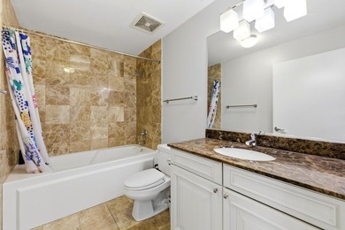 Experience elevated city living in this well-maintained - photo 9