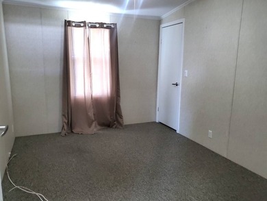 THIS HOME IS ON LEASED LAND WITH A MONTHLY LOT RENT OF $542 AND - photo 59