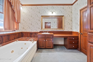 Set on 27 wooded acres in Lafayette, LA, this rare private - photo 11