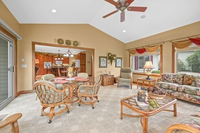 This stately patio home built by Larson Builders overlooks the - photo 14