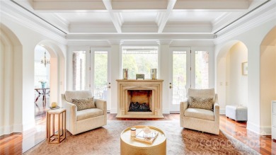 Enjoy luxurious gated living in this European inspired enclave