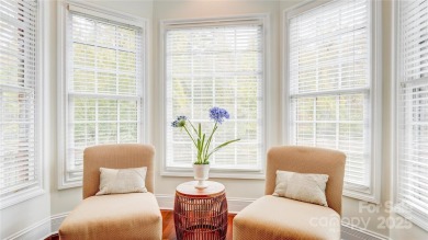 Enjoy luxurious gated living in this European inspired enclave