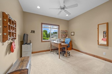 This stately patio home built by Larson Builders overlooks the - photo 18