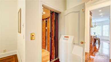 Enjoy luxurious gated living in this European inspired enclave