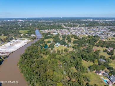 Set on 27 wooded acres in Lafayette, LA, this rare private - photo 24