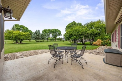 This stately patio home built by Larson Builders overlooks the - photo 25