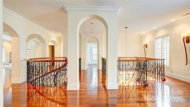 Enjoy luxurious gated living in this European inspired enclave