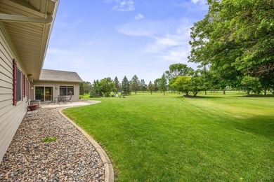 This stately patio home built by Larson Builders overlooks the - photo 26