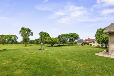 This stately patio home built by Larson Builders overlooks the - photo 29