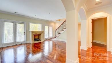 Enjoy luxurious gated living in this European inspired enclave