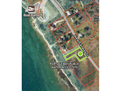 1/2 acre vacant land parcel on Portage Lake - Lake Lot Sale Pending in Onekama, Michigan