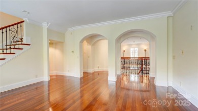 Enjoy luxurious gated living in this European inspired enclave