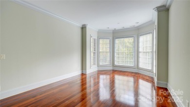 Enjoy luxurious gated living in this European inspired enclave