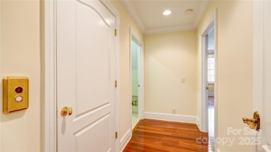 Enjoy luxurious gated living in this European inspired enclave