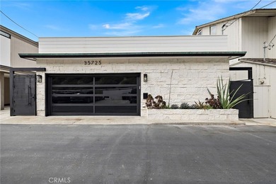 Experience the ultimate in beachfront living on one of Dana - photo 34