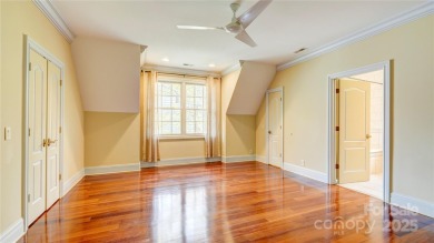 Enjoy luxurious gated living in this European inspired enclave