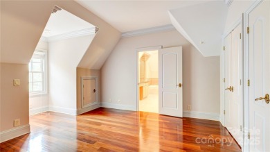 Enjoy luxurious gated living in this European inspired enclave