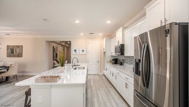 The Venice at Golden Gate Estates presents an elevated take on - photo 7