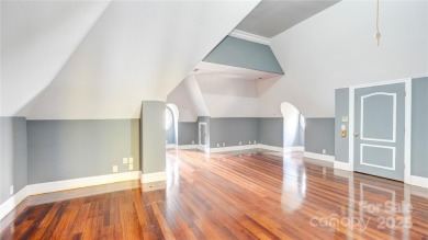 Enjoy luxurious gated living in this European inspired enclave