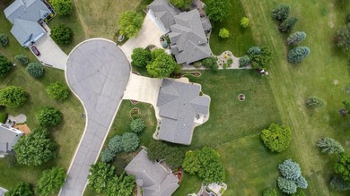 This stately patio home built by Larson Builders overlooks the - photo 38