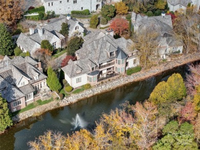 Enjoy luxurious gated living in this European inspired enclave