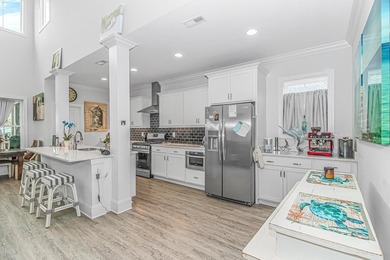 Coastal luxury meets effortless living in the gated Intracoastal - photo 7