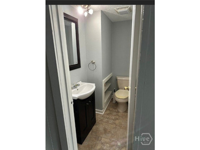 Welcome to this updated, 3 bedroom, 2.5 bath brick townhome. The - photo 11