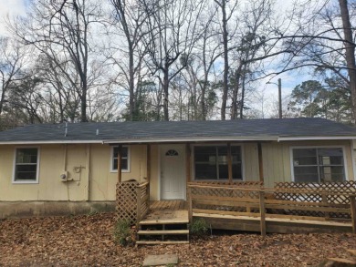 Adorable Home close to Toledo Bend Lake! This three bedroom one - Lake Home Sale Pending in Hemphill, Texas