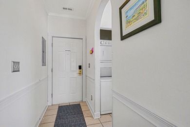 Welcome to this beautifully maintained 2-bedroom, 2-bath condo