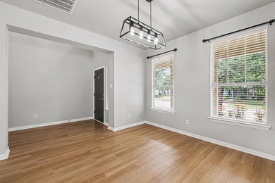 Welcome to this beautifully maintained 4-bedroom, 2.5-bath home - photo 4