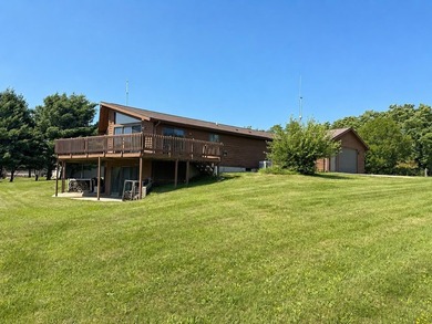 Nestled on 2.93 picturesque acres with a wooded backdrop, this - photo 4