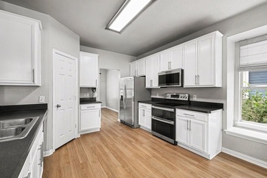 Welcome to this beautifully maintained 4-bedroom, 2.5-bath home - photo 10