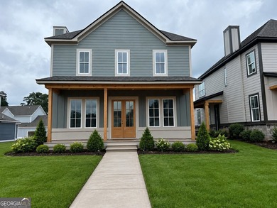 Welcome to this cottage style planning community in the - photo 1