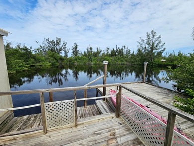 This home is situated directly on the water! Amazing location - photo 14