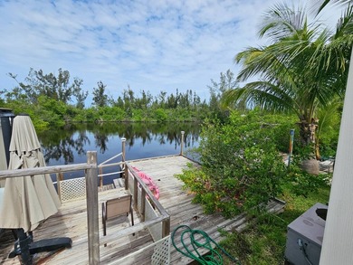This home is situated directly on the water! Amazing location - photo 21