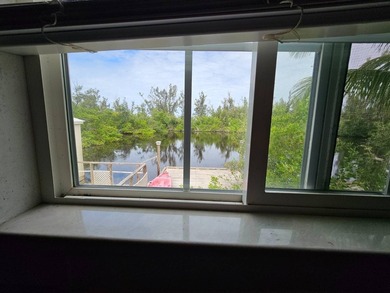 This home is situated directly on the water! Amazing location - photo 34