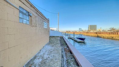 This solid, single-story masonry building offers a functional - photo 5
